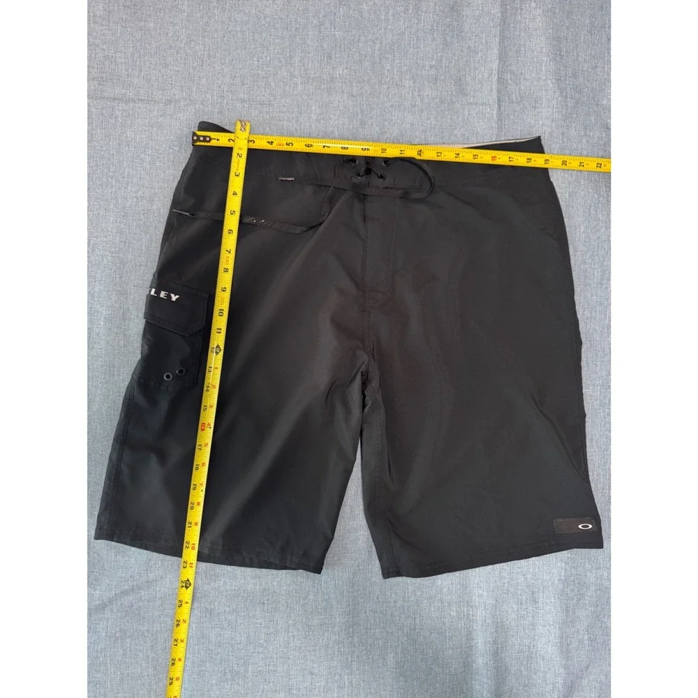 Oakley Kana 21 Mens Board Shorts Black Cargo Pocket Swim Trunks Regular Fit  38